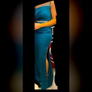 A beautiful maxi satin azure blue gown. Worn once only for couple of hours.